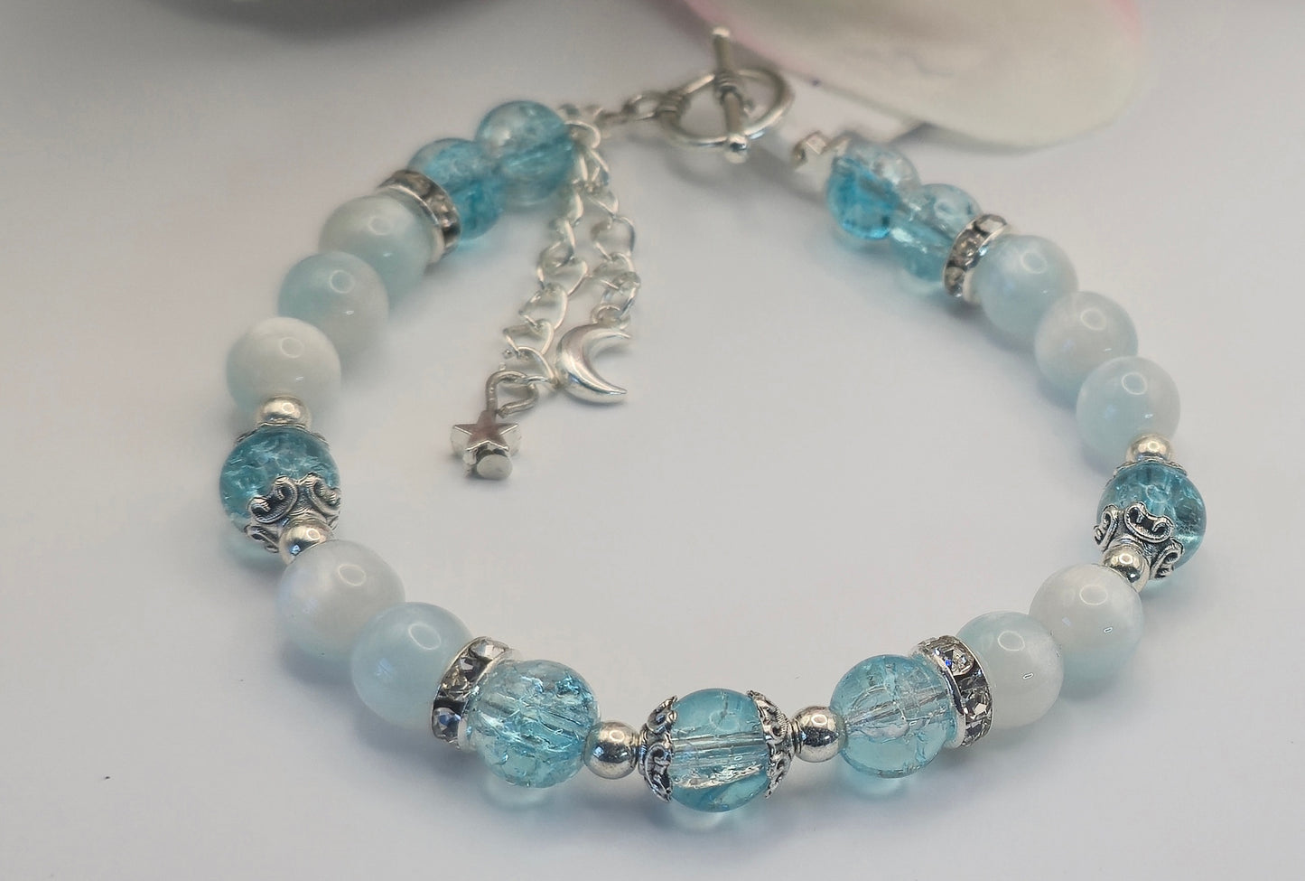 Aqua blue moon and stars